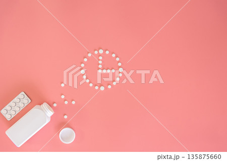 Flat lay, pills on a pink background, conceptual minimalism, medicine. Flat lay, pills on a pink background, conceptual minimalism, medicine. 135875660