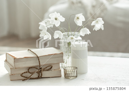 Spring composition with details of home decor in the interior of the room. 135875804