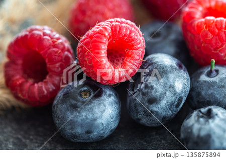 Natural background with different wild berries, macro shot. 135875894