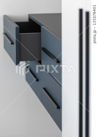 Contrasting planes. Blue matte. Black pulls. Contrasting planes. Blue matte. Black pulls. 135876401
