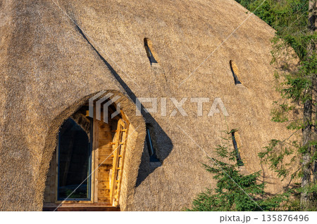 Details of eco thatched house. Natural lifestyle in harmony with nature 135876496