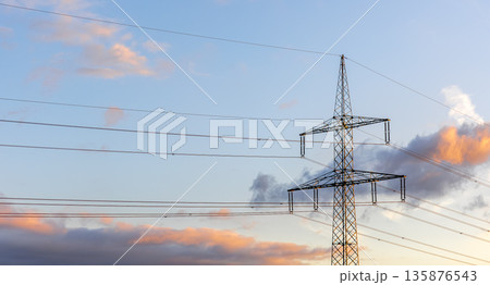 High-voltage line. Sunset and electricity. Modern design High-voltage line. Sunset and electricity. Modern design 135876543