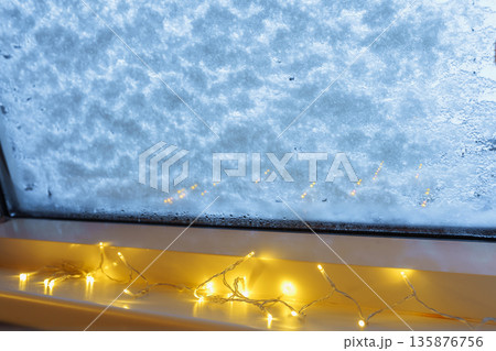 window glass is covered in snow window glass is covered in snow 135876756