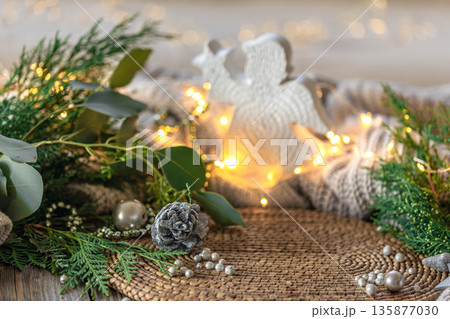Christmas background. With light garland and Christmas tree branches. Christmas background. With light garland and Christmas tree branches. 135877030
