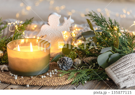 Cozy Christmas composition. Christmas candle. Cozy Christmas composition. Christmas candle. 135877115