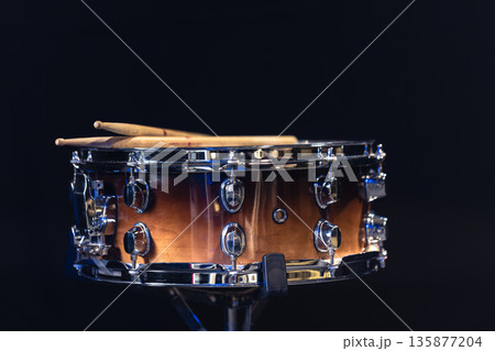 Drum close-up. Drumsticks with a drum. 135877204