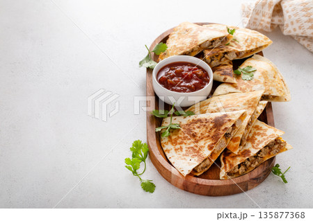 Ground turkey and cheddar quesadillas with salsa Ground turkey and cheddar quesadillas with salsa 135877368