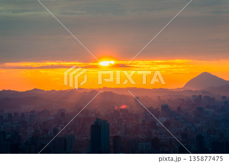 Breathtaking Sunrise Over Taipei City from Dadao Mountain, Shulin, Taiwan. 135877475