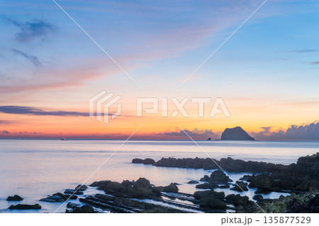 Dreamy Dawn Over Keelung Islet from Wanli New Taipei Taiwan. Dreamy Dawn Over Keelung Islet from Wanli New Taipei Taiwan. 135877529