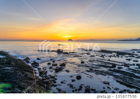 Taiwan Wanli Sunrise Over Keelung Islet Dreamy Pink Orange Sky Rocks. 135877530