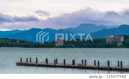 Rolling Waves and Moving Clouds Over Sun Moon Lake in Yuchi Township Taiwan. Rolling Waves and Moving Clouds Over Sun Moon Lake in Yuchi Township Taiwan. 135877540