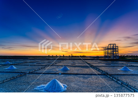 Beimen Salt Field Taiwan Sunset Serenity with Dramatic Rays. 135877575