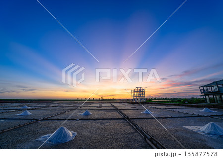 Beimen Salt Field Taiwan Sunset Serenity with Dramatic Rays. 135877578