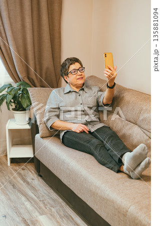 Senior woman with mobile phone Senior woman with mobile phone 135881094