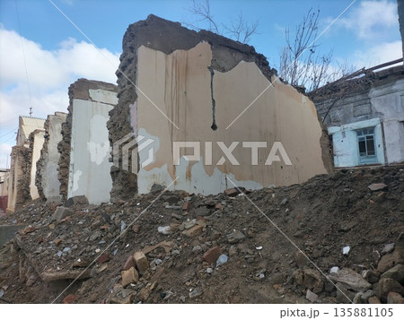 Remains of almost destroyed one-story residential private house in form of standing brick walls, piles of construction debris or building. Renovation program. High cost of land for sale in cities Remains of almost destroyed one-story residential private house in form of standing brick walls, piles of construction debris or building. Renovation program. High cost of land for sale in cities 135881105