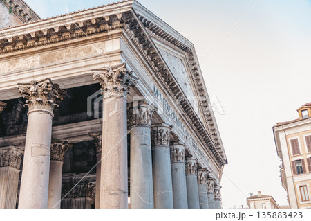 Pantheon in Rome, portico, massive granite columns. Ancient Roman temple. Pantheon in Rome, portico, massive granite columns. Ancient Roman temple. 135883423