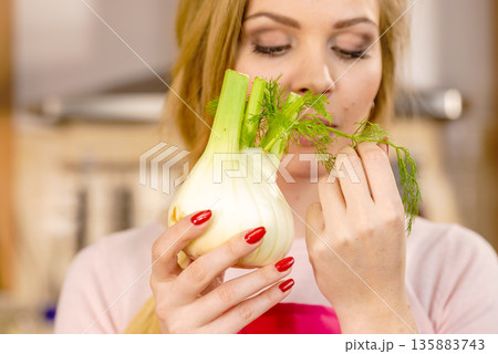 Woman holding fennel bulb Woman holding fennel bulb 135883743