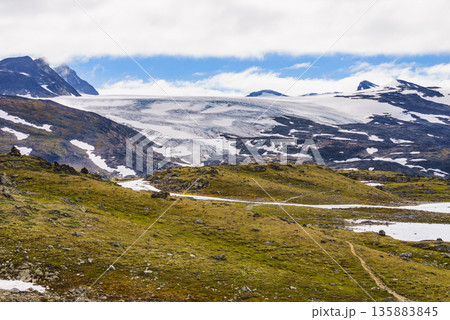 Mountains with ice glacier. Road Sognefjellet, Norway Mountains with ice glacier. Road Sognefjellet, Norway 135883845