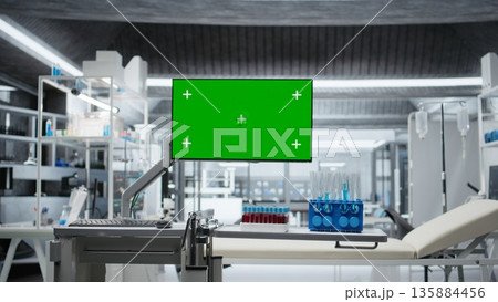 Chroma key screen in empty laboratory with sterile equipment, digital monitors and microscopes ready for testing and experimentation. Biotechnology research driving healthcare innovation. 135884456