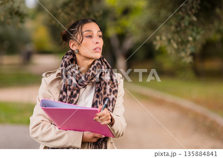 Volunteer collecting signatures working on street 135884841