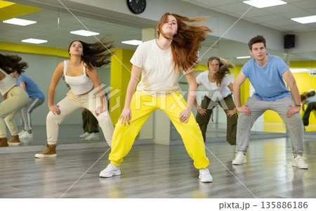 Teen girl dancing modern dances in dance studio 135886186
