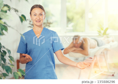 masseuse at massage room 135886296