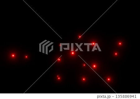 黒背景に浮かぶたくさんの赤の粒子 135886941