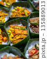 Indonesian Rice Meals Wrapped in Banana Leaf 135889013