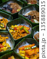 Indonesian Rice Meals Wrapped in Banana Leaf 135889015