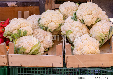 Fresh organic cauliflower vegetable in crate Fresh organic cauliflower vegetable in crate 135890751