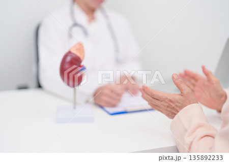 Elderly Patient consultation with doctor for Kidney disease, Urinary system and Stones, Cancer, world kidney day, Chronic kidney, Urology, Nephritis, Renal, Transplant and medical healthcare concept Elderly Patient consultation with doctor for Kidney disease, Urinary system and Stones, Cancer, world kidney day, Chronic kidney, Urology, Nephritis, Renal, Transplant and medical healthcare concept 135892233