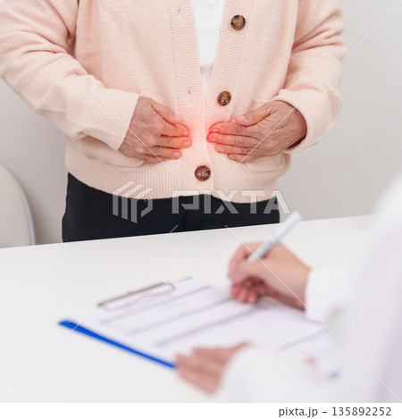 Elderly woman Patient consultation with doctor for Colon disease, Large Intestine, Colorectal cancer, Ulcerative colitis, Diverticulitis, Irritable bowel syndrome, Digestive system and Healthcare Elderly woman Patient consultation with doctor for Colon disease, Large Intestine, Colorectal cancer, Ulcerative colitis, Diverticulitis, Irritable bowel syndrome, Digestive system and Healthcare 135892252