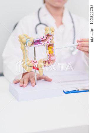 Elderly woman Patient consultation with doctor for Colon disease, Large Intestine, Colorectal cancer, Ulcerative colitis, Diverticulitis, Irritable bowel syndrome, Digestive system and Healthcare Elderly woman Patient consultation with doctor for Colon disease, Large Intestine, Colorectal cancer, Ulcerative colitis, Diverticulitis, Irritable bowel syndrome, Digestive system and Healthcare 135892258