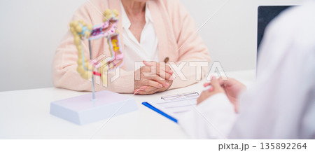 Elderly woman Patient consultation with doctor for Colon disease, Large Intestine, Colorectal cancer, Ulcerative colitis, Diverticulitis, Irritable bowel syndrome, Digestive system and Healthcare 135892264