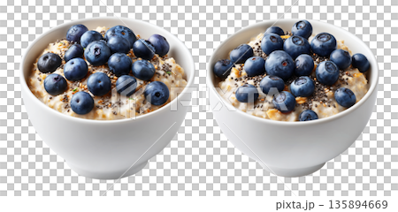 Fresh blueberries and chia seeds on creamy oatmeal in white ceramic bowl, isolated on white transparent background 135894669