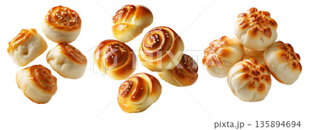 Panipopo sweet rolls baked in coconut milk with golden crust isolated on white background, concept of bakery and food freshness 135894694