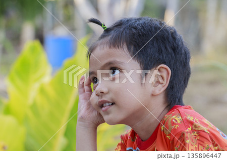 Portrait of Asian boy outdoor 135896447