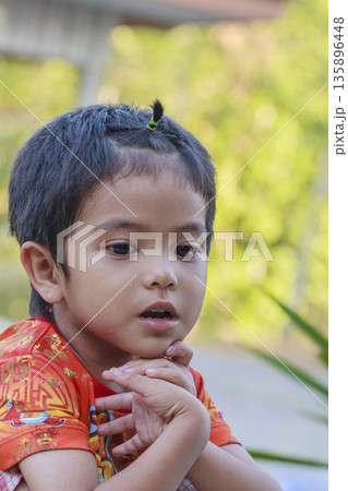 Portrait of Asian boy outdoor 135896448