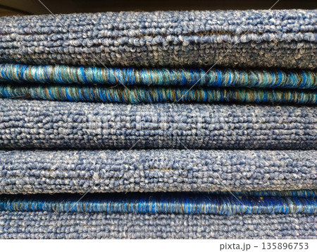 Blue Textured Carpet Fabric Samples Stacked for Home Decor Blue Textured Carpet Fabric Samples Stacked for Home Decor 135896753