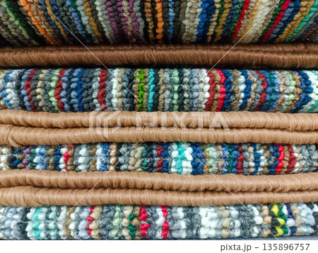 Colorful Striped Carpet Samples with Brown Bound Edges 135896757