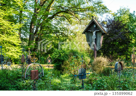 Church St.Clemens in Kranzberg with ancient graveyard and old wr Church St.Clemens in Kranzberg with ancient graveyard and old wr 135899062