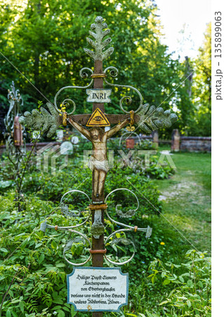 Church St.Clemens in Kranzberg with ancient graveyard and old wr Church St.Clemens in Kranzberg with ancient graveyard and old wr 135899063
