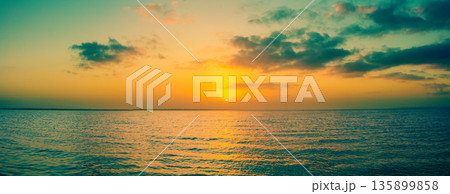 Sunset over the sea. Horizontal banner Sunset over the sea. Horizontal banner 135899858