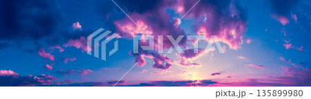 Blue-pink cloudy sky at sunset. Horizontal banner 135899980