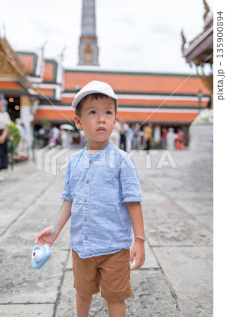 Young Boy Captures Memories At Bangkok Temple With Miniature Camera Young Boy Captures Memories At Bangkok Temple With Miniature Camera 135900894