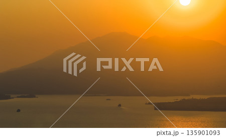 Jan 10 2026 Golden Sun Sets Above Tranquil Hills At Nai Wan Bay Jan 10 2026 Golden Sun Sets Above Tranquil Hills At Nai Wan Bay 135901093