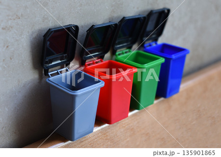 Colorful recycling toy boxes, plastic classification trash cans as children's educational toys. Ecology and next generation concept 135901865
