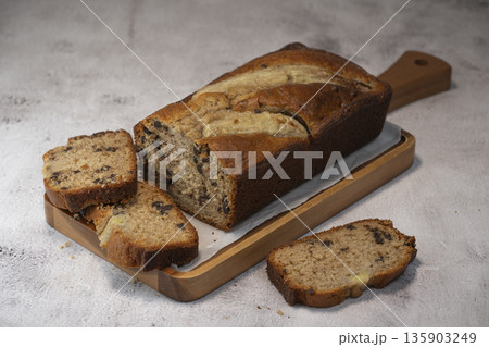 Delicious homemade banana bread sliced and ready to enjoy 135903249