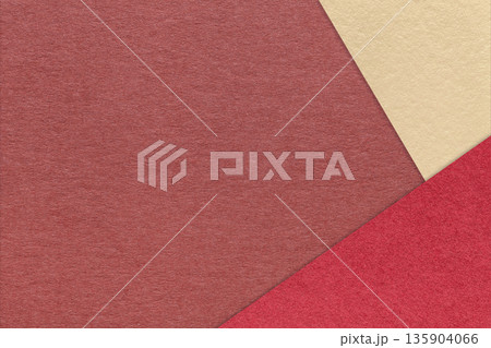 Maroon textured paper background with red beige triangular corners and copy space. Template for presentation, banner 135904066