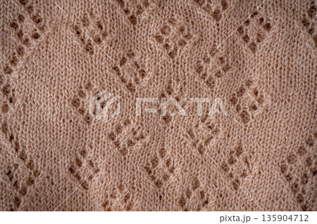 Texture Sweater Knit Fabric with Diamond Pattern background 135904712